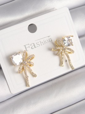 Erb Pirinç Gold Renk Zirkon Taşlı Kurdele Model Kadın Küpe